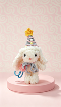 Bubblegum Bunny with a Blue Hat and a Pink Bag